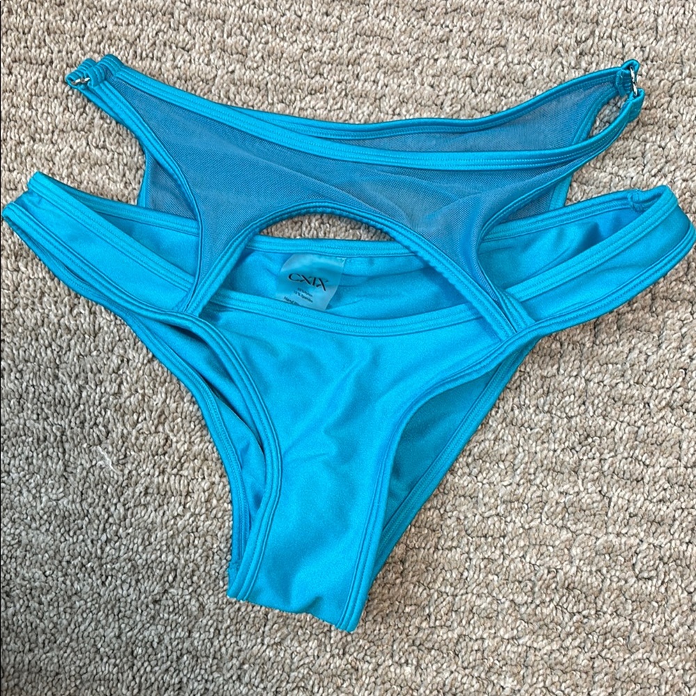 CXIX aqua blue pole shorts with Strappy Cutout Details